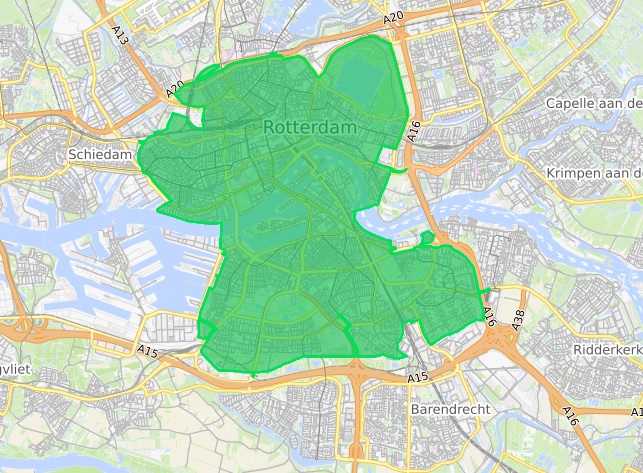 Et bykart med veier, elv og et avgrenset, grønnfarget område over sentrum.